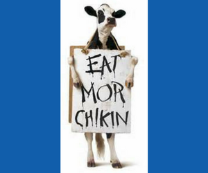  chick-fil-a cow holding sign that says eat more chicken